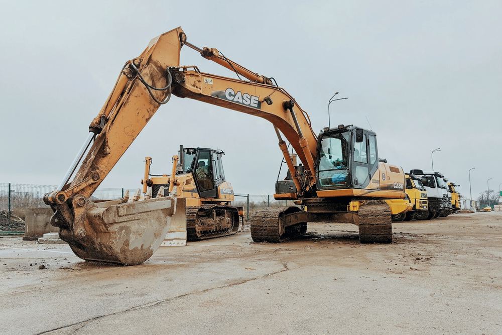 Tracked excavators parked on a worksite